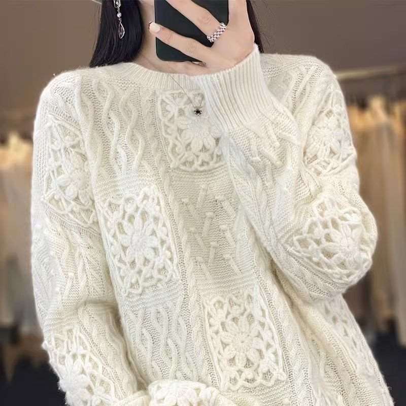 "Women's round neck crocheted hollow knit sweater."