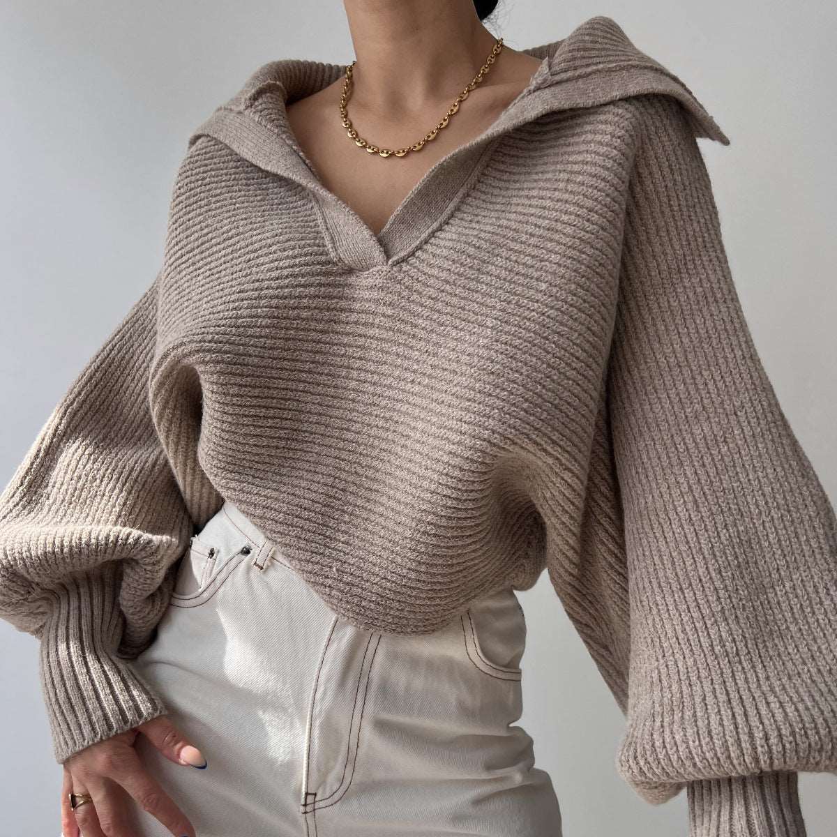 "New knitted lapel pullover sweater top for women."