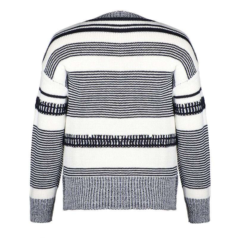 Modern knitted black and white striped sweater for women with a loose fit