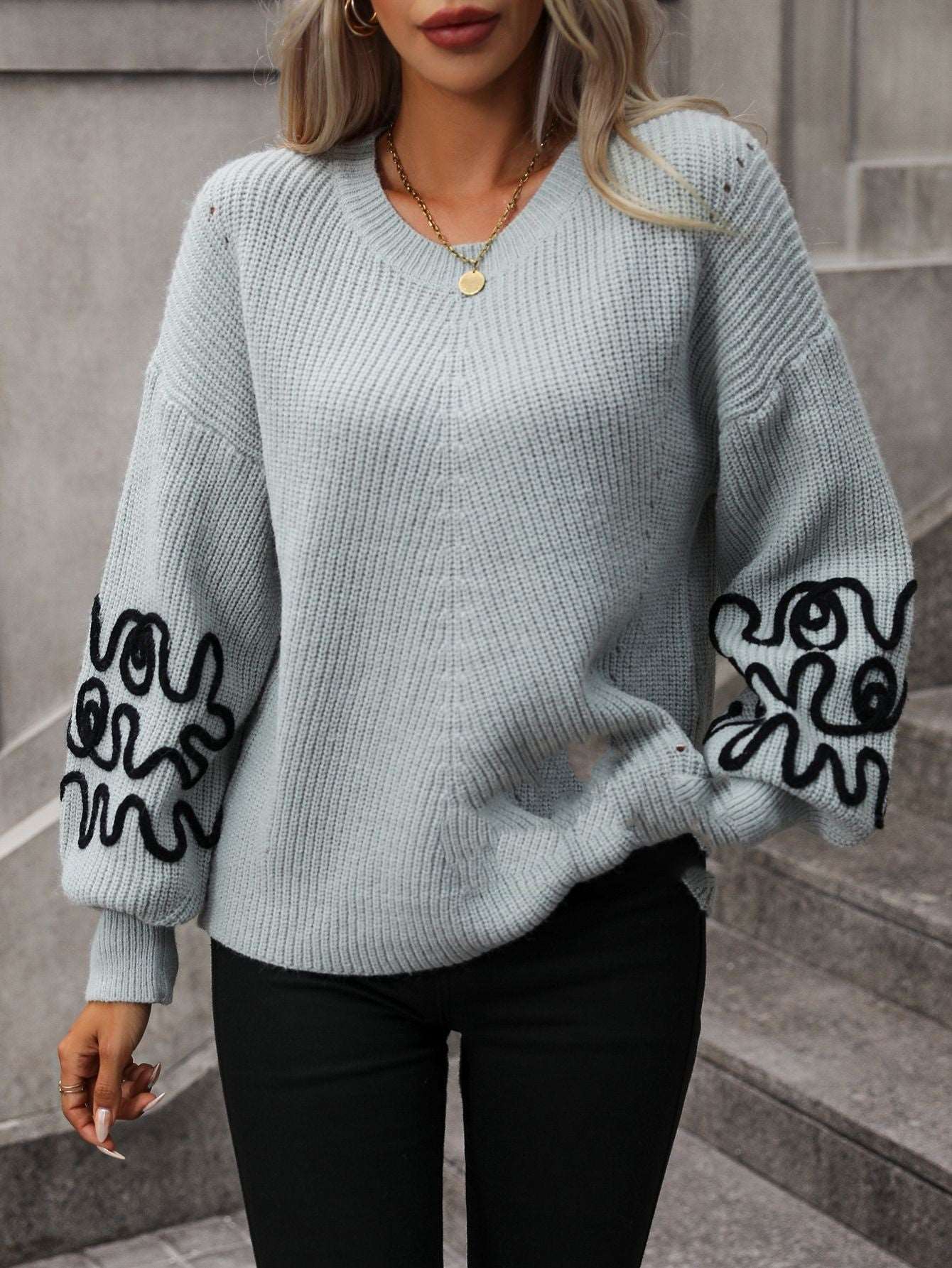 "Women's knitwear solid color pattern sweater."