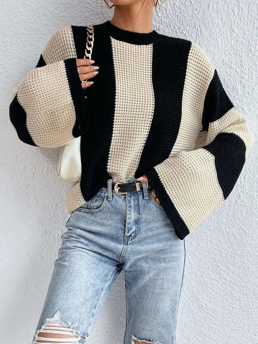 Striped knitted sweater with a round neckline for women