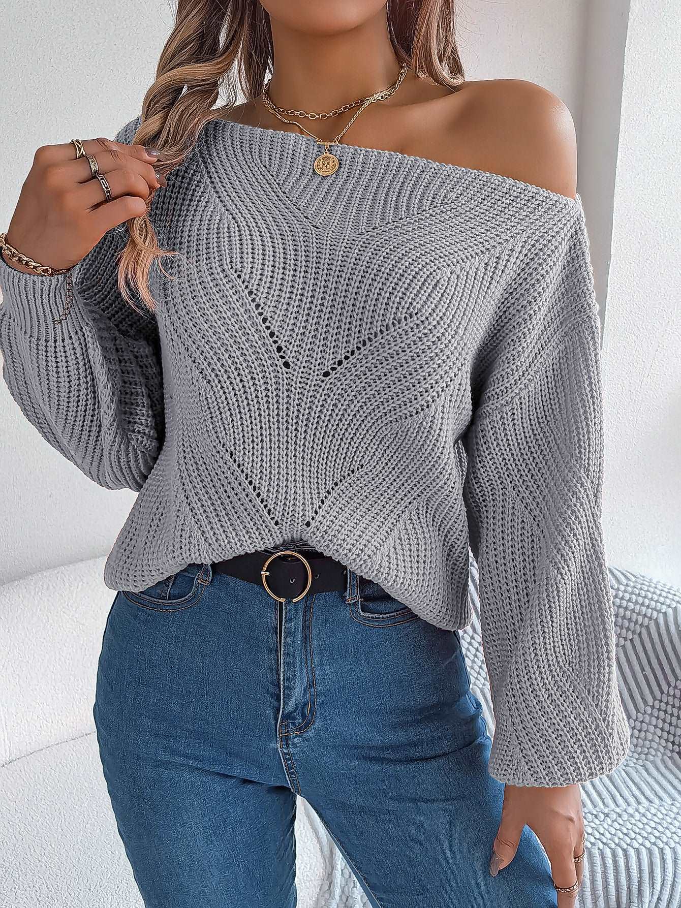 "Women's casual sweater with hollow-out off-neck and off-the-shoulder lantern sleeves."