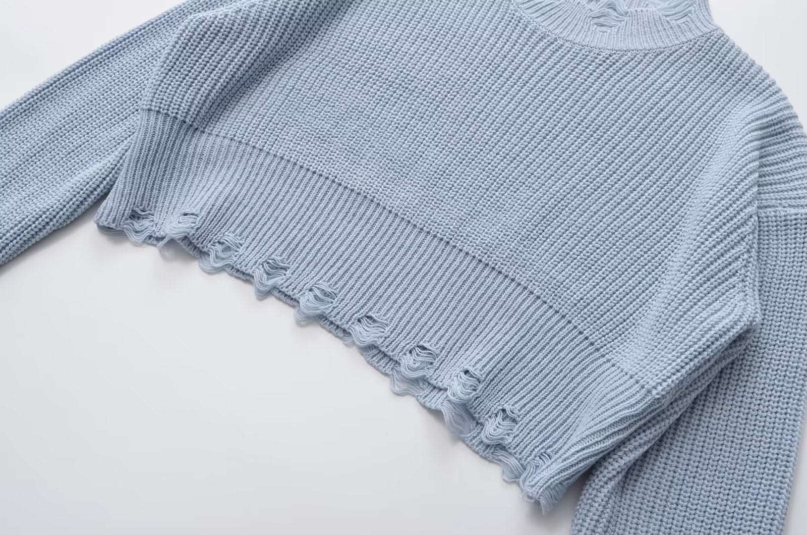 "Women's retro lazy ripped sweater."