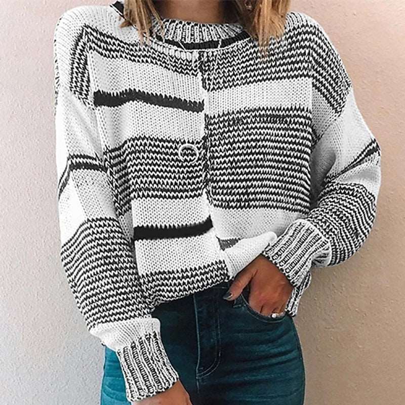 Modern knitted black and white striped sweater for women with a loose fit