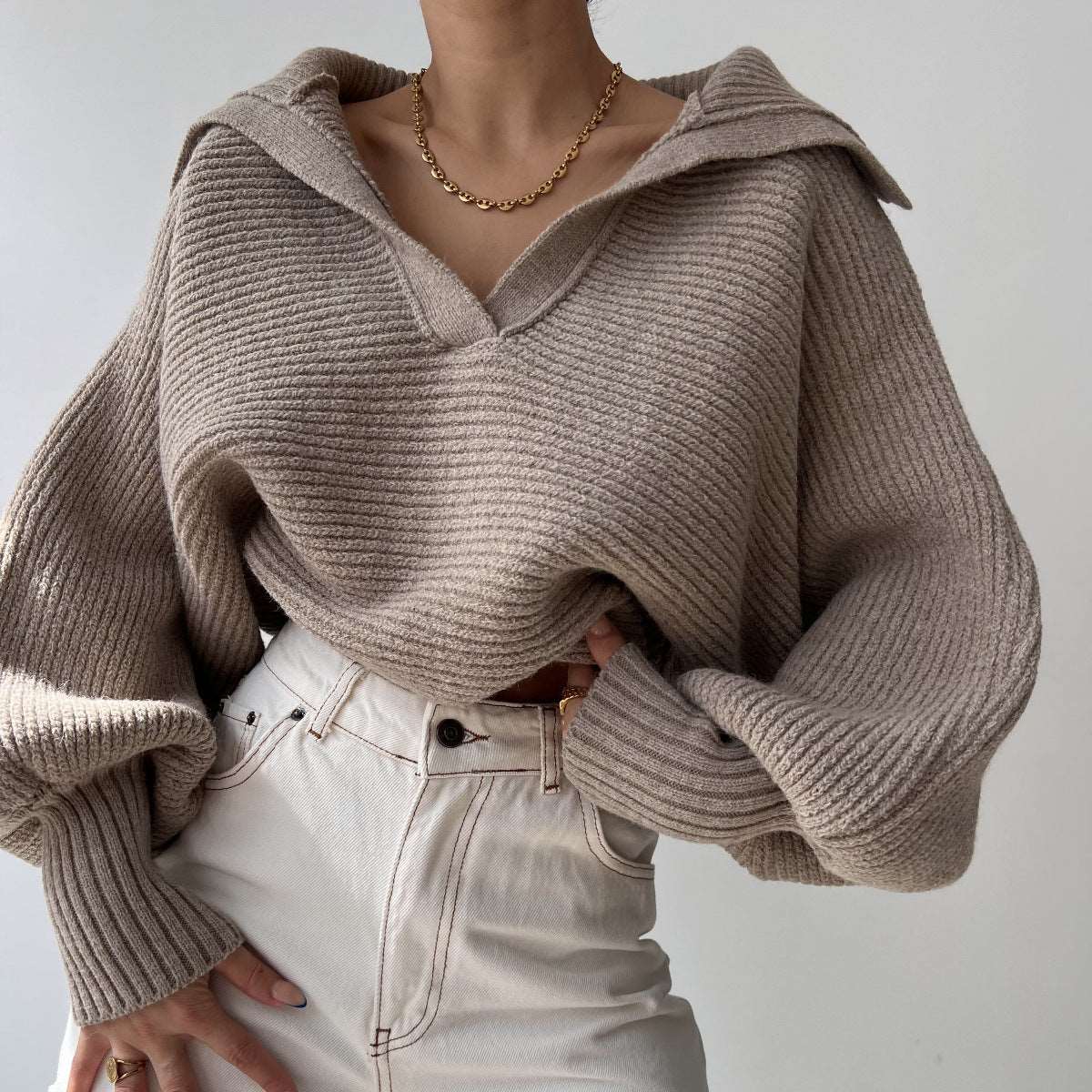 "New knitted lapel pullover sweater top for women."