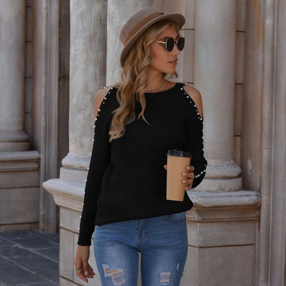 "Stylish beaded off-the-shoulder sweater for women."