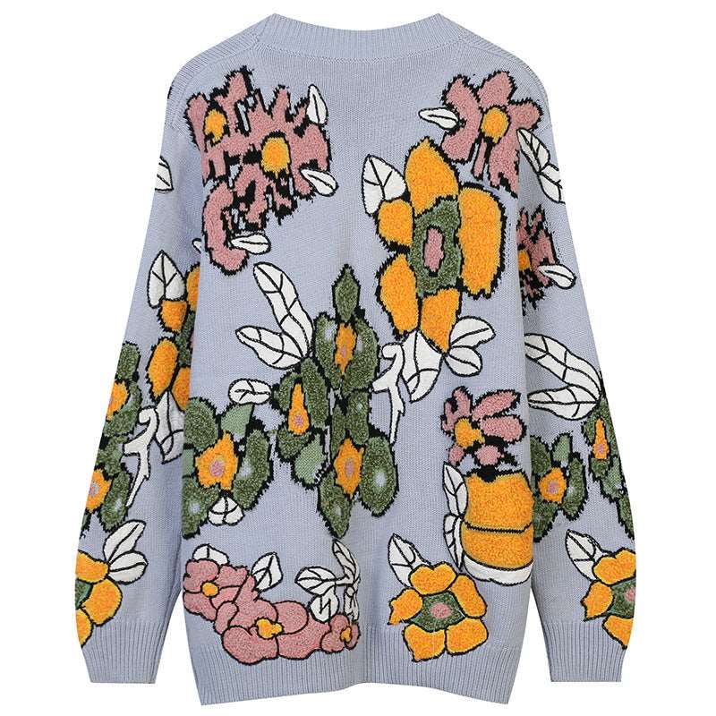 "Women's floral jacquard knit sweater, featuring long sleeves and a casual loose fit."