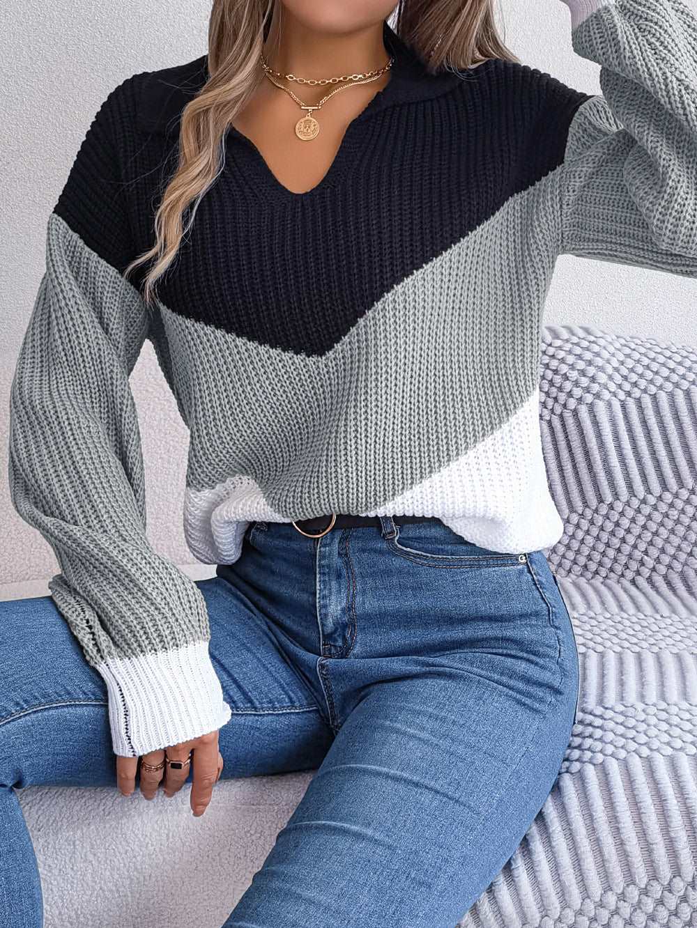 "Women's fashion long sleeve knitted sweater."