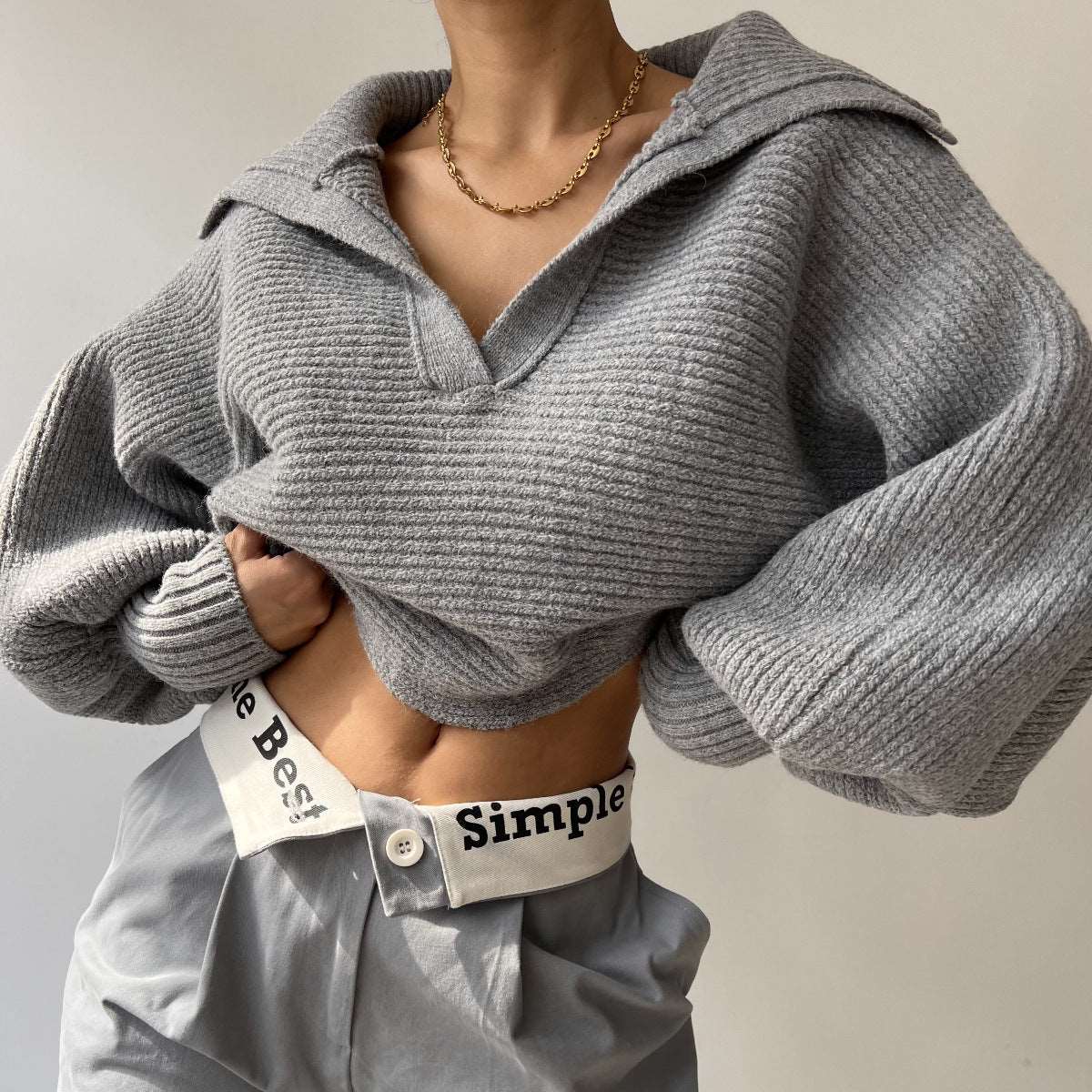 "New knitted lapel pullover sweater top for women."