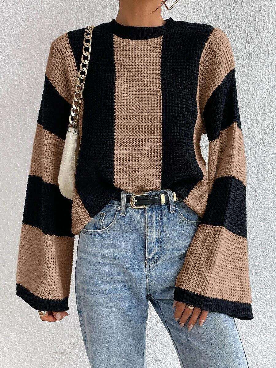 Striped knitted sweater with a round neckline for women