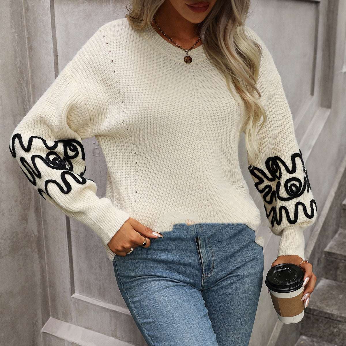 "Women's knitwear solid color pattern sweater."