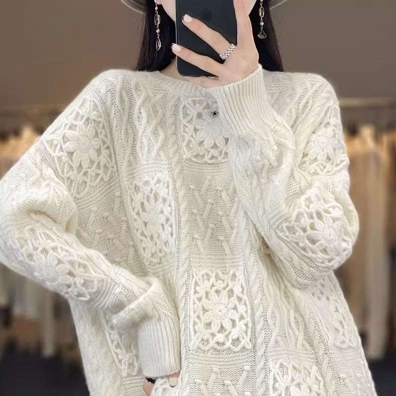 "Women's round neck crocheted hollow knit sweater."