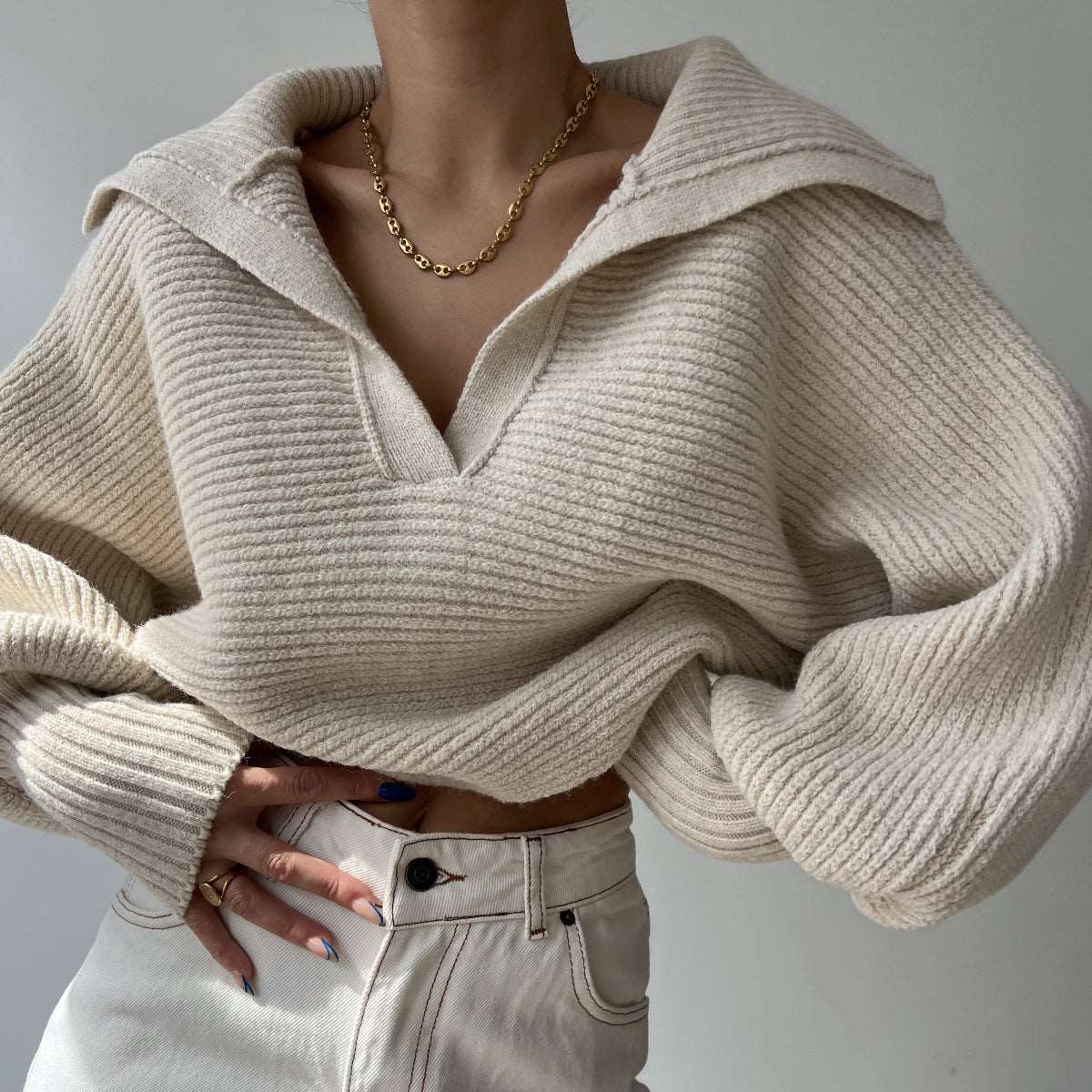 "New knitted lapel pullover sweater top for women."