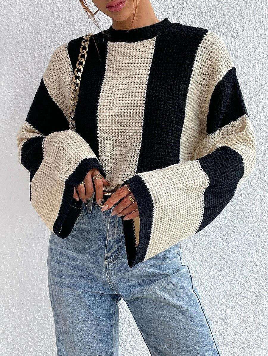 Striped knitted sweater with a round neckline for women