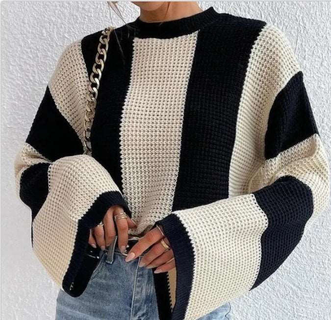 Striped knitted sweater with a round neckline for women